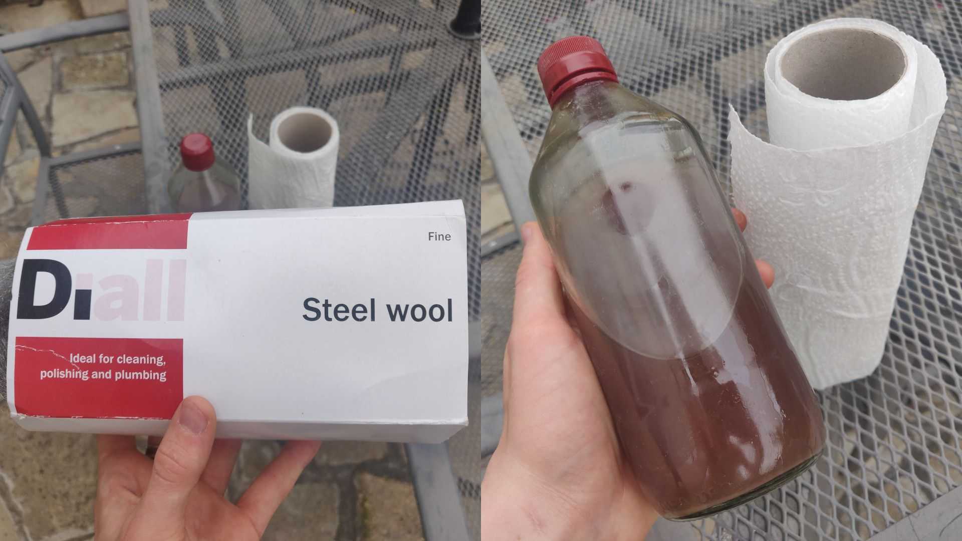 Steel wool side-by-side to a Sarson's malt vinegar bottle containing Danish Oil and a roll of kitchen towel.